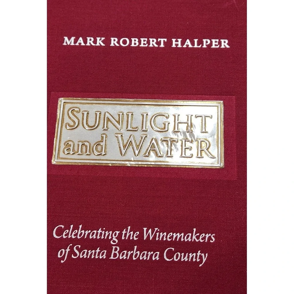 Sunlight and Water book with a red cover